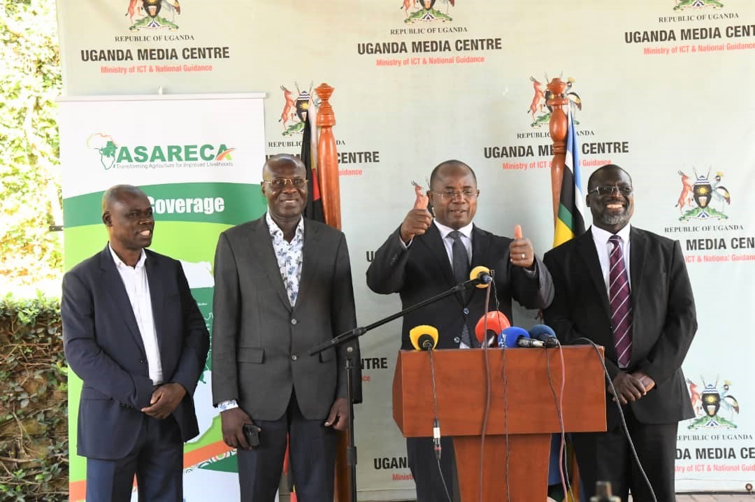 Hon. Kyakulaga (2nd right) flanked by Dr. Warinda (r) and MAAIF and ASARECA staff at the press briefing in Kampala