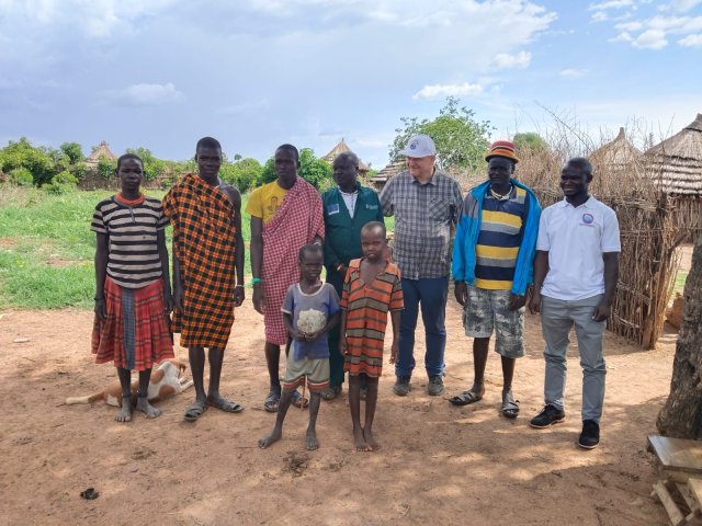 Mr. Yunusu Hamira (extreme right) and Prof. Hans Sölkner (3rd right) interact with Nakapiripirit LC1 chairman & community members who confirmed interest in CBBP.