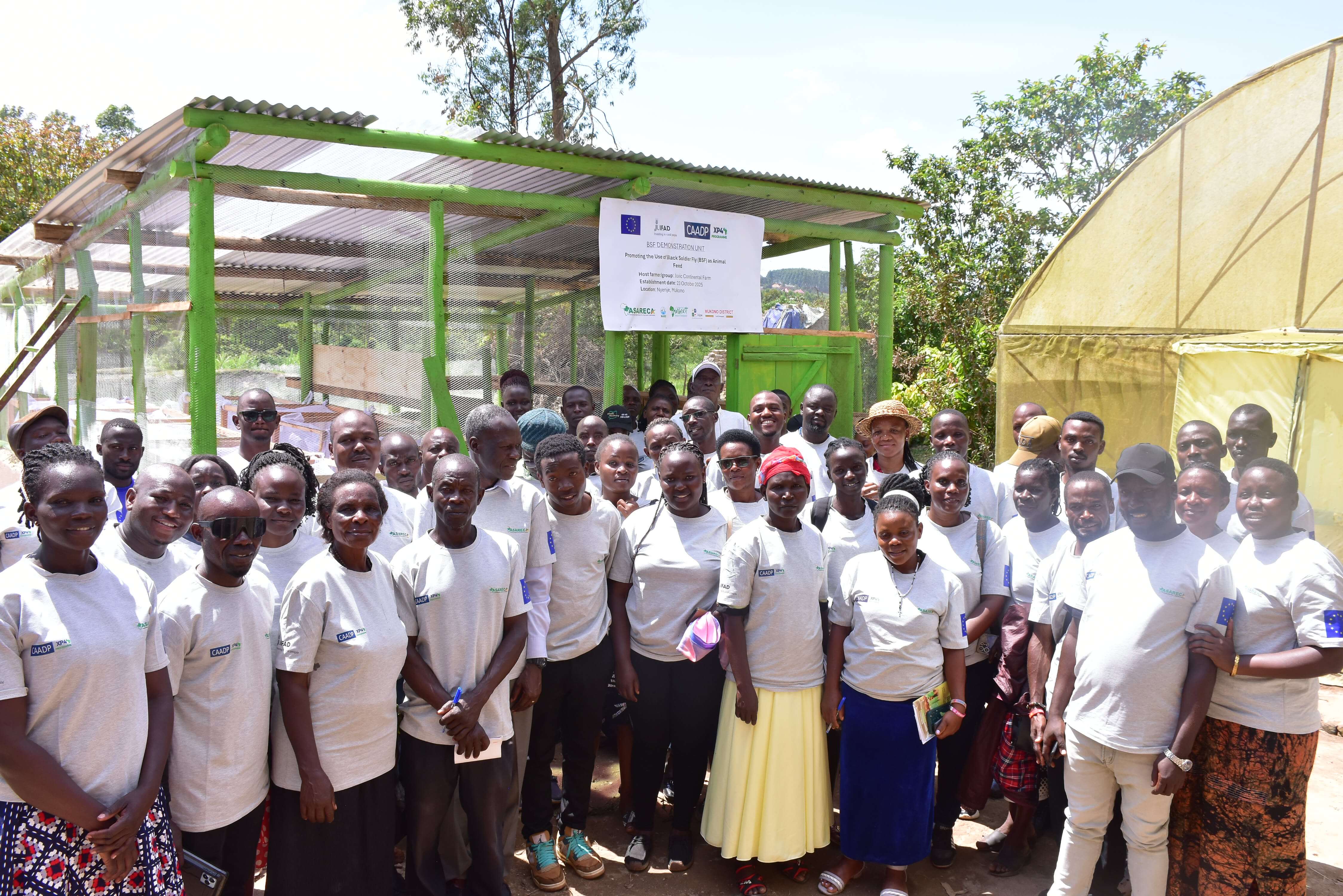 Some of beneficiaries from the training on BSF establishment and management during a field demonstration visit at JUVIC farm in Mukono, Uganda, where a BSF facility was established.